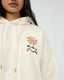 All About Eve Elements Oversized Hoodie in oat color with pink floral graphic print detail, shown on studio background