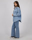 All About Eve Dale Shacket in light blue denim, oversized fit with chest pockets and curved hem, styled with wide-leg jeans