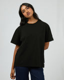 All About Eve Basic Monogram Tee in black, relaxed-fit cotton t-shirt with ribbed neckline shown against light background