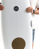 Person holding a white surfboard with a logo on a plain background