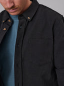 Close-up view of Just Another Fisherman Anchorage Shirt in black linen-cotton blend featuring chest pocket and button details