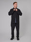 Just Another Fisherman Anchorage black linen-cotton shirt shown on model against grey background, buttoning collar