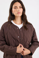 STORIES BE TOLD APEX COLLARLESS QUILTED JACKET - CHOCOLATE