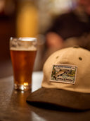 JUST ANOTHER FISHERMAN CASTING & MENDING CAP - IVORY/GREEN