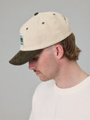 JUST ANOTHER FISHERMAN CASTING & MENDING CAP - IVORY/GREEN