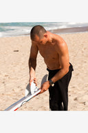 FCS II JULIAN WILSON PC THRUSTER IN BLACK / BLACK - LARGE