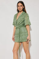 MON RENN ELOWEN MINI DRESS GREEN ON MODEL WHITE BACKGROUND