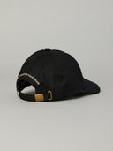 JUST ANOTHER FISHERMAN STAMP TILLER WAX CAP - BLACK