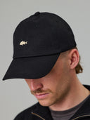 JUST ANOTHER FISHERMAN STAMP TILLER WAX CAP - BLACK