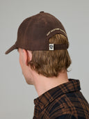 JUST ANOTHER FISHERMAN STAMP TILLER WAX CAP - BROWN