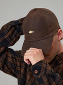 JUST ANOTHER FISHERMAN STAMP TILLER WAX CAP - BROWN
