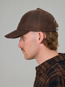 JUST ANOTHER FISHERMAN STAMP TILLER WAX CAP - BROWN